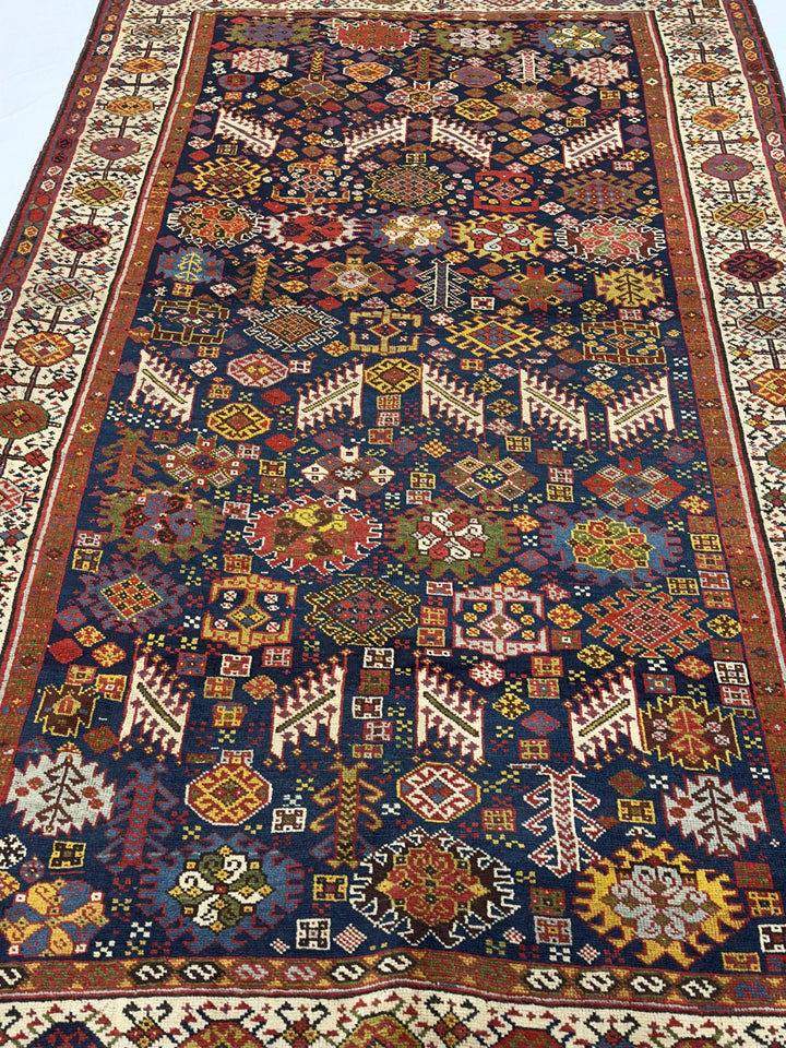 Antique Persian Qashqai Rug 5’3" x 9’1”